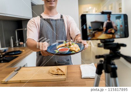 The chef is broadcasting live from workshop how to prepare a vegetarian food The chef is broadcasting live from workshop how to prepare a vegetarian food 115817895
