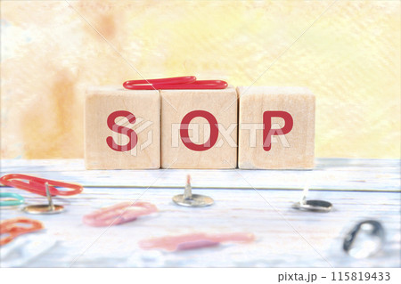 SOP - Standard Operating Procedure, text on wooden cubes on a yellow background SOP - Standard Operating Procedure, text on wooden cubes on a yellow background 115819433