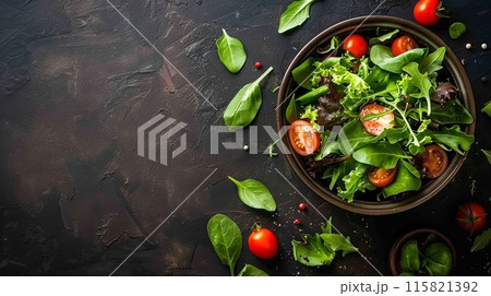Healthy salad in a bowl on rustic background --ar 25:14 Job ID: 6216744b-5d4a-4ee4-9a0a-67dbdcf02a7b 115821392