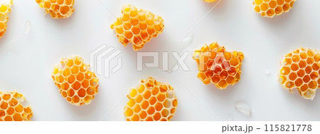 Honeycombs on the bottom of white background with copyspace for your text 115821778