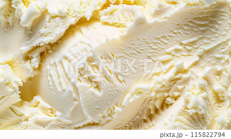 A detailed close-up of smooth, creamy vanilla ice cream showcasing its rich texture and inviting appearance.. 115822794