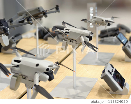 Modern drone for video and photo in the light store Modern drone for video and photo in the light store 115824030