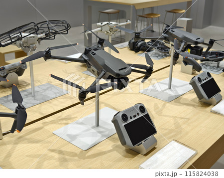 Modern drone for video and photo in the light store 115824038