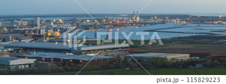 Awesome drone view of the industrial and port area of Ravenna at evening Awesome drone view of the industrial and port area of Ravenna at evening 115829223
