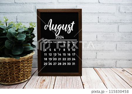 August 2024 monthly calendar on chalkboard for planning and management 115830458