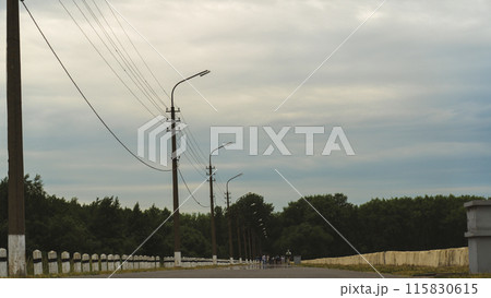 The road along the embankment with street lights 115830615