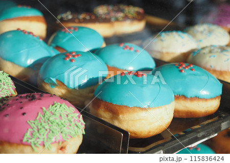 chocolate donuts display for sale at local store chocolate donuts display for sale at local store 115836424