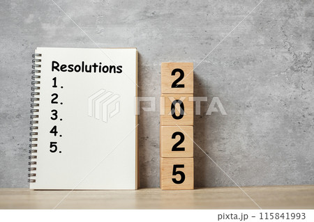 2025 Happy New Year with Resolution notebook and wooden number. countdown, Goals, Plan, Action and Mission Concept 115841993