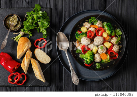 chicken meatball soup with vegetables in a bowl chicken meatball soup with vegetables in a bowl 115846388