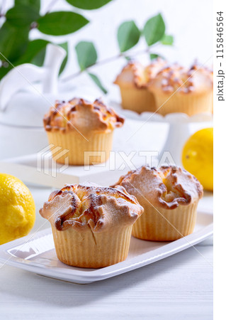 Soffioni - italian ricotta cheese and lemon cakes. Soffioni - italian ricotta cheese and lemon cakes. 115846564