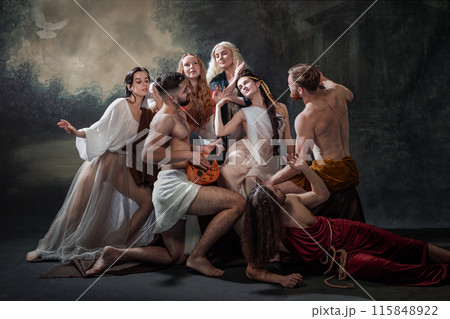 Gathering of Souls. group of people, dressed in flowing garments, gather around man playing lute against misty, forested background, Gathering of Souls. group of people, dressed in flowing garments, gather around man playing lute against misty, forested background, 115848922