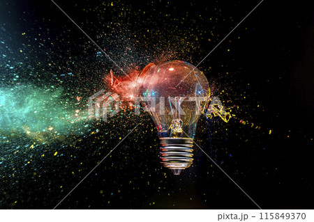 Light bulb exploding with colorful powder 115849370