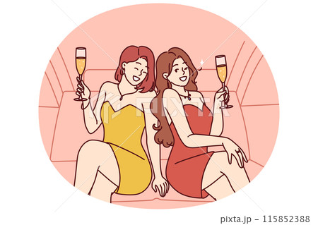 Celebrity women sit in luxury car with glasses filled with sparkling wine during bachelorette party 115852388