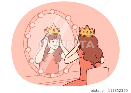 Little actress tries on crown sitting near mirror and dreams of playing role of princess on theater 115852390