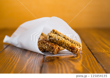 sweet sticks candy made from sunflower seeds sweet sticks candy made from sunflower seeds 115854135
