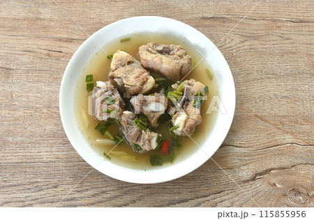 hot and spicy pork bone with tamarind and Thai herbs soup on plate 115855956