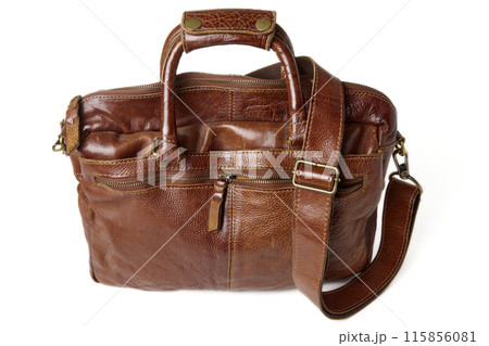 Vintage rough cowhide leather briefcase isolated on a white background. Brown laptop and document bag Vintage rough cowhide leather briefcase isolated on a white background. Brown laptop and document bag 115856081