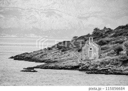 Beautiful little abandoned chapel at the coast of Hvar island 115856684