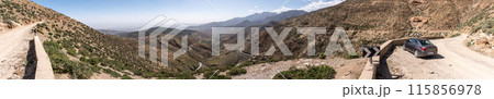 Scenic mountain landscape at northern Tizi n'Test pass in the Atlas mountains, the road meanders upwards Scenic mountain landscape at northern Tizi n'Test pass in the Atlas mountains, the road meanders upwards 115856978