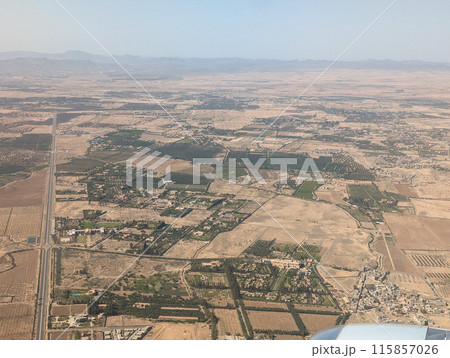 Aerial view of the Moroccan landscape and Marrakesh 115857026