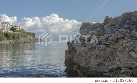 Seascape. Apartments on the rocky seashore (Greece, Crete). Stock photo. 115857166