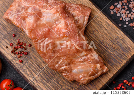 Raw pork or beef ribs in honey sauce with salt, spices 115858605