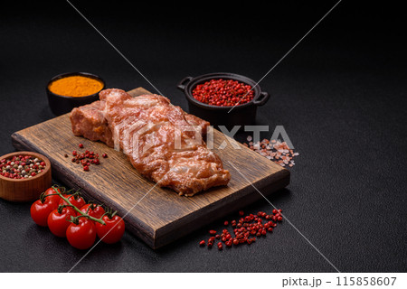 Raw pork or beef ribs in honey sauce with salt, spices 115858607