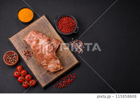 Raw pork or beef ribs in honey sauce with salt, spices Raw pork or beef ribs in honey sauce with salt, spices 115858608