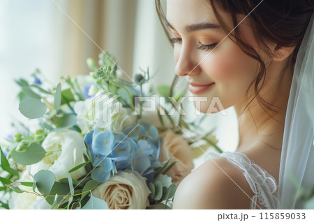 ブーケに顔を寄せる花嫁 115859033