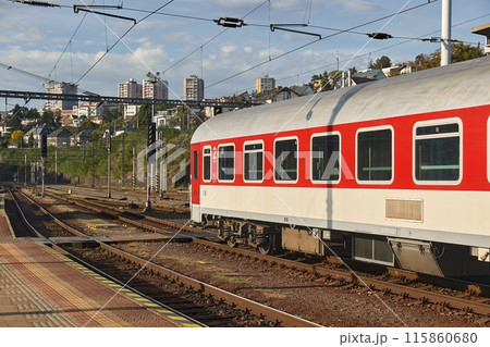 Train on the railroad station 115860680