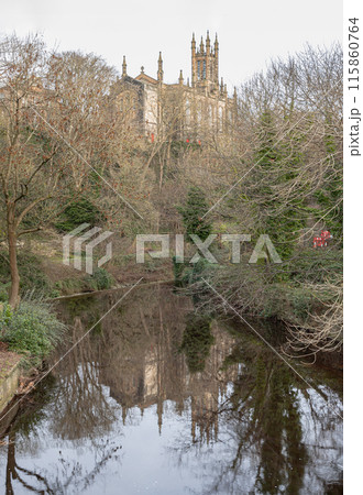The Rhema Christian Centre Church (Holy Trinity Church) among tree branches with surface reflection on water The Rhema Christian Centre Church (Holy Trinity Church) among tree branches with surface reflection on water 115860764