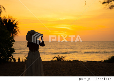 Sunset at the beach bar in Mai Khao Beach Resort in Phuket Thailand 115861547
