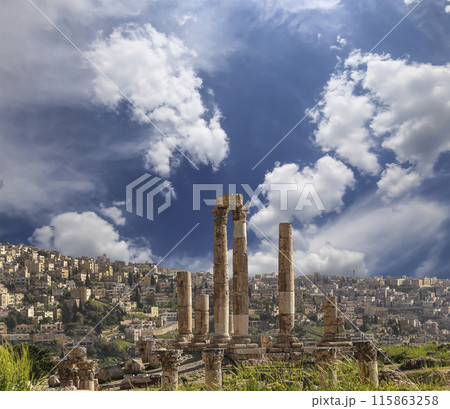 Amman city landmarks-- old roman Citadel Hill, Jordan. Against the background of a beautiful sky with clouds 115863258