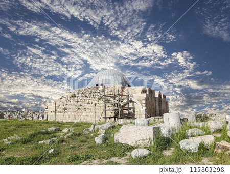 Amman city landmarks-- old roman Citadel Hill, Jordan. Against the background of a beautiful sky with clouds 115863298