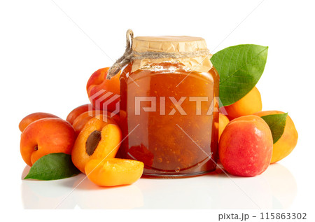 Apricot jam in glass jar and fresh fruits isolated on white. 115863302