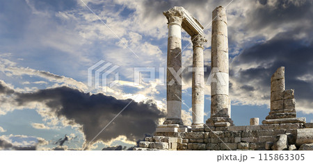 Amman city landmarks-- old roman Citadel Hill, Jordan. Against the background of a beautiful sky with clouds Amman city landmarks-- old roman Citadel Hill, Jordan. Against the background of a beautiful sky with clouds 115863305