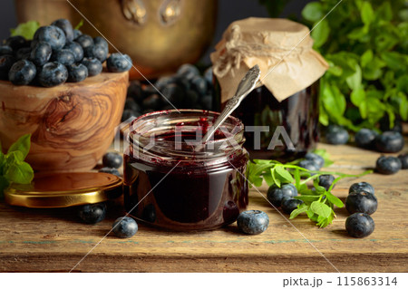 Blueberry jam with fresh berries. 115863314