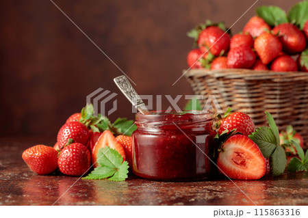 Strawberry jam and fresh berries. 115863316