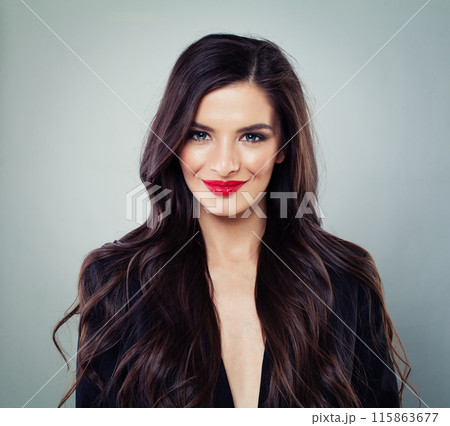 Happy young adult model woman with long healthy wavy hairstyle, fresh shiny clear skin Happy young adult model woman with long healthy wavy hairstyle, fresh shiny clear skin 115863677