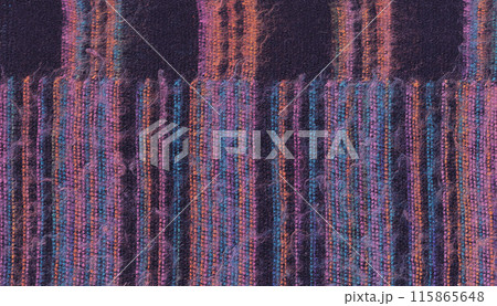 Nepalese textile background. Woven ethnic fabric texture Nepalese textile background. Woven ethnic fabric texture 115865648