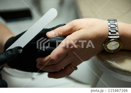 Professional nail care treatment in beauty salon Professional nail care treatment in beauty salon 115867166