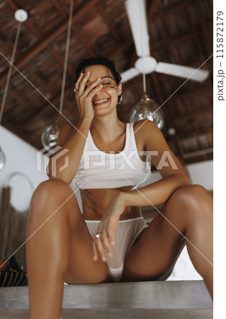 Sexy Asian Model Playfully Laughing in a Bali Villa 115872179