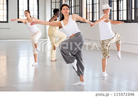 dancers training in a dance studio dancers training in a dance studio 115872896