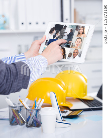 Video conference on smartphone or tablet, business meeting. Communication with business colleagues via video conference closeup 115873160