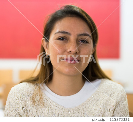 Beautiful thoughtful latina close up 115873321
