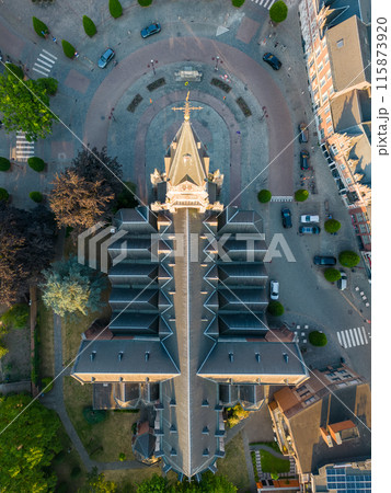 Capture a breathtaking aerial view of a historical European cathedral from a panoramic perspective 115873920