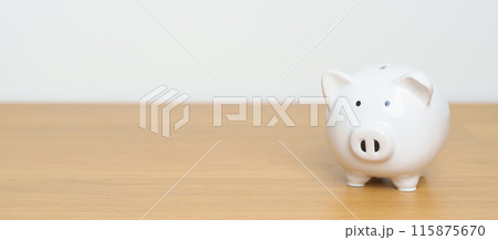 Money Saving for Future Plan, Retirement fund, Pension, Investment, Wealth Business and Financial concepts. piggy bank on table, Money Counting for World Savings day and Donate Money Saving for Future Plan, Retirement fund, Pension, Investment, Wealth Business and Financial concepts. piggy bank on table, Money Counting for World Savings day and Donate 115875670