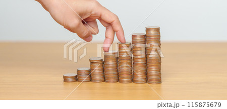 Money Saving for Future Plan, Retirement fund, Pension, Investment, Wealth, Salary and Financial concepts. hand step up coin on table, Money Counting and stack arrangement for Growth Money Saving for Future Plan, Retirement fund, Pension, Investment, Wealth, Salary and Financial concepts. hand step up coin on table, Money Counting and stack arrangement for Growth 115875679