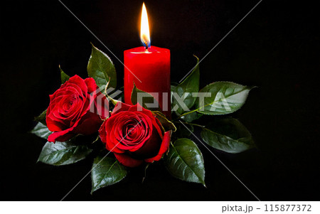 two red roses and a burning red candle on a black background 115877372