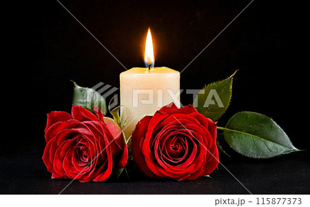 burning white candle and two red roses 115877373